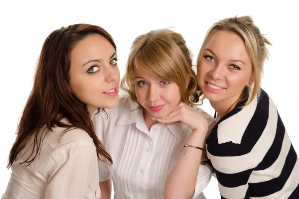 Three smiling young women Stock Picture