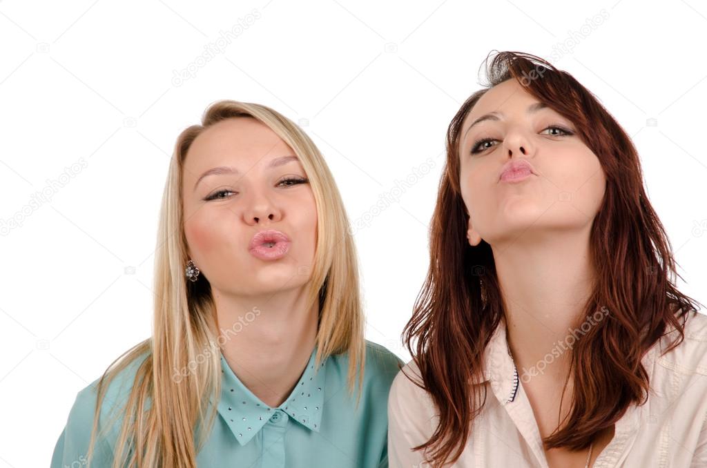 Two sexy girls begging for a kiss