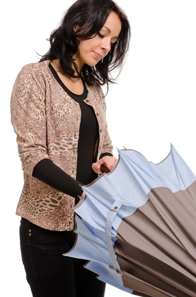 Woman closing or opening her umbrella — Stock Photo, Image