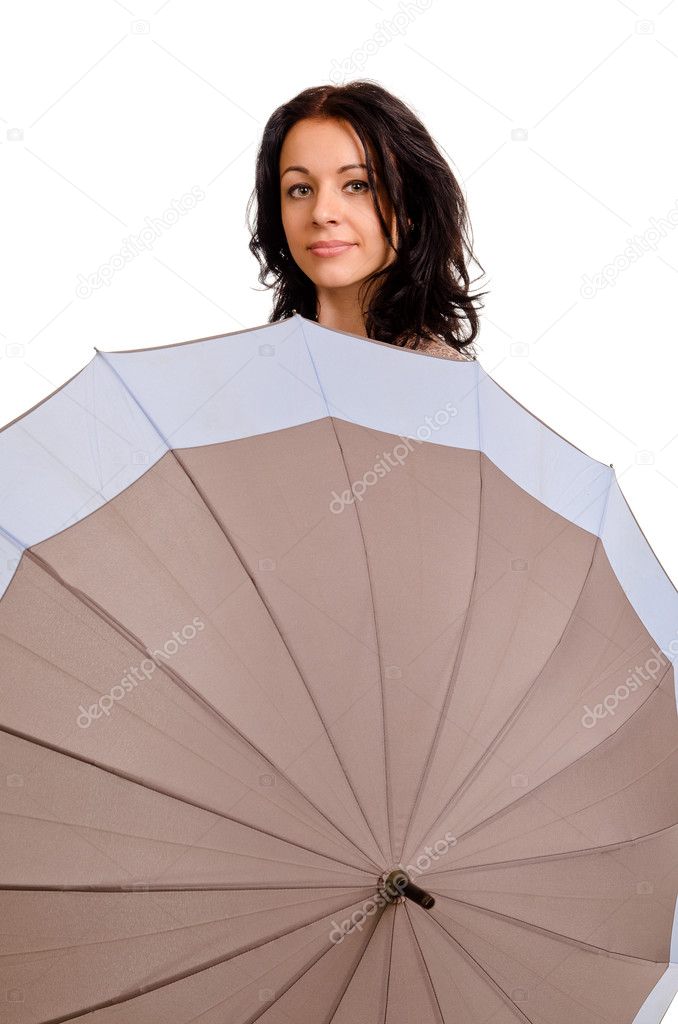 Positive young woman behind an umbrella