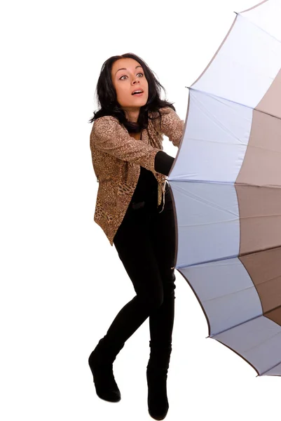 Woman struggling with an umbrella — Stock Photo, Image