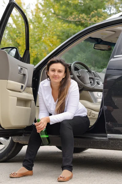 Woman drunkard in a car — Stock Photo, Image