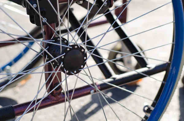 Spokes on the wheel of a wheelchair — Stock Photo, Image