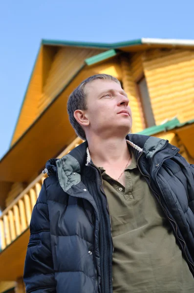 Handsome man standing thinking — Stock Photo, Image