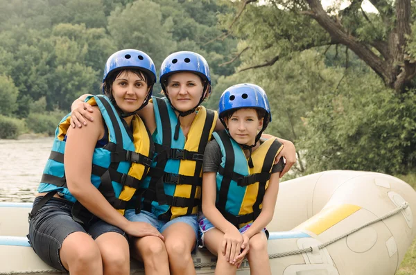 Two women and a child going rafting — Stock Photo, Image