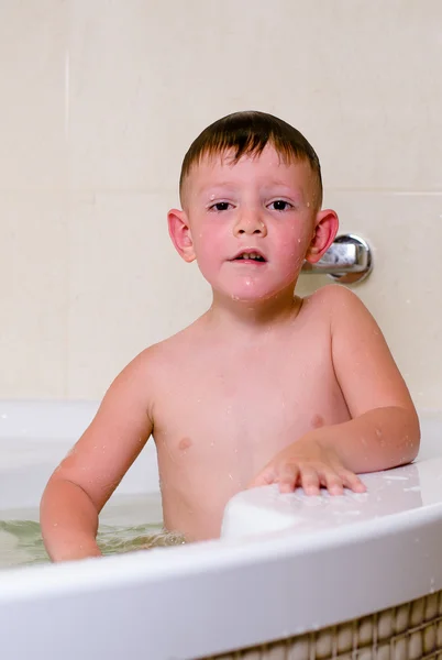 Boy with bubbles on his head — Stock Photo, Image