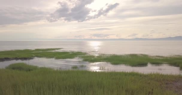 Aerial View Panning Left Grass Showing Beautiful Sunset Pocatiere Quebec — Stockvideo