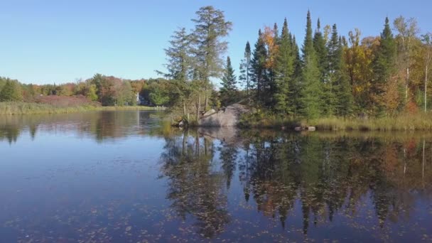 Aerial Drone Video Moving Very Slowly Calm Water Lake Fall — Stockvideo