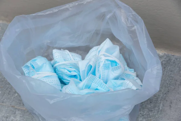 Used Folded Face Masks Plastic Bag — Stock Photo, Image