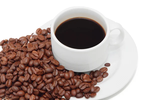 Cup of coffee with coffee beans in the background — Stock Photo, Image