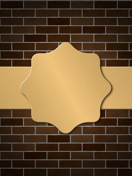 Golden plate on brick wall — Stock Photo, Image