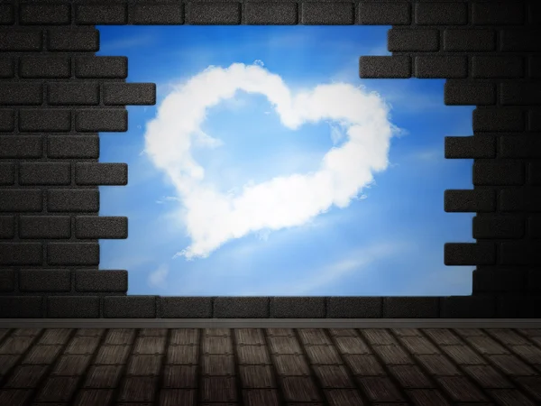 Heart of clouds in hole in brick wall — Stock Photo, Image