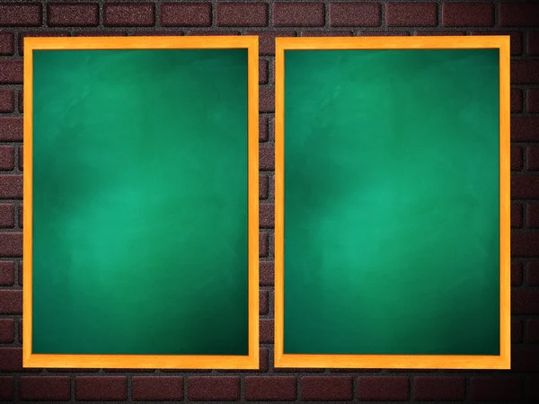 Two chalkboards of green color on brick wall — Stock Photo, Image