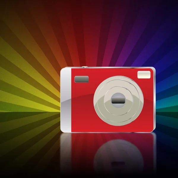 Červený fotoaparát na barevné pozadí — Stock fotografie