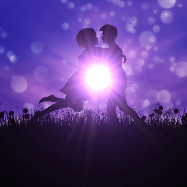 Couple silhouette on grass field — Stock Photo, Image