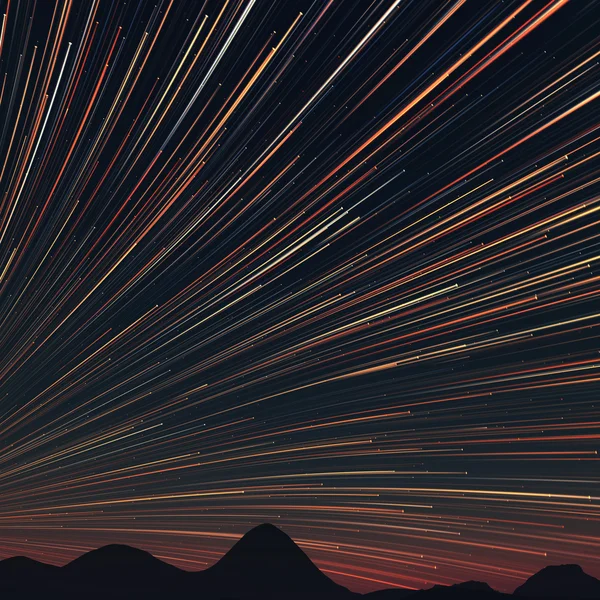 Senderos de estrellas y rocas lejanas — Foto de Stock