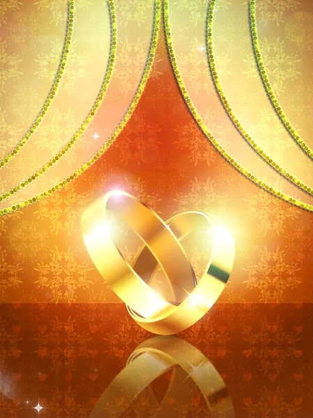 Wedding rings on yellow background — Stock Photo, Image