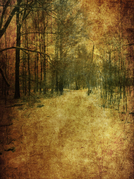 Vintage grunge yellow paper texture with winter bare trees landscape.