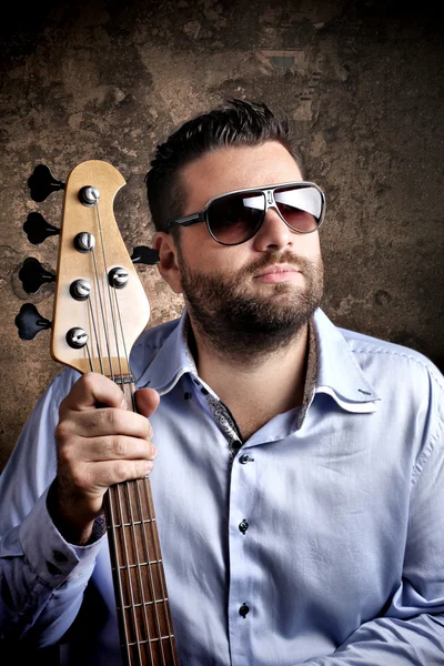 Bass player with glasses — Stock Photo, Image