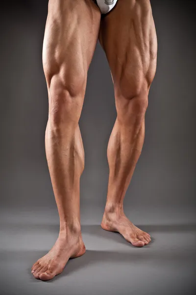 Muscular male legs — Stock Photo, Image