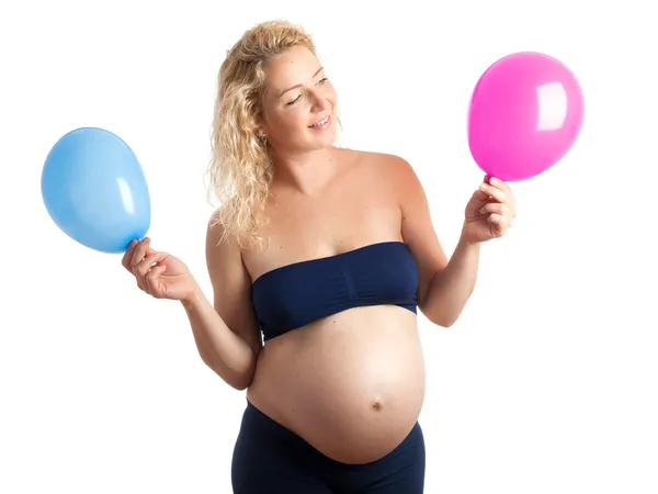 Pregnant woman with blue and pink baloon — Stock Photo, Image