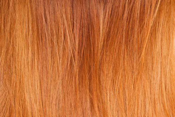 Bakgrund av ljusa röda naturliga hår — Stockfoto
