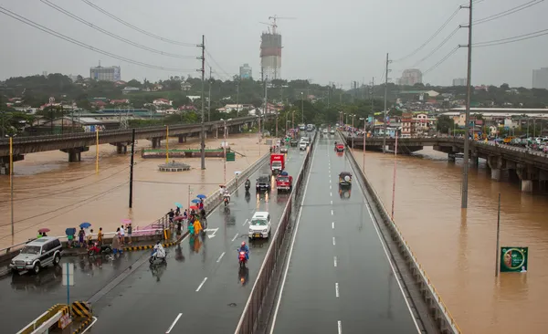 Inundação em Manila, Filipinas Fotos De Bancos De Imagens