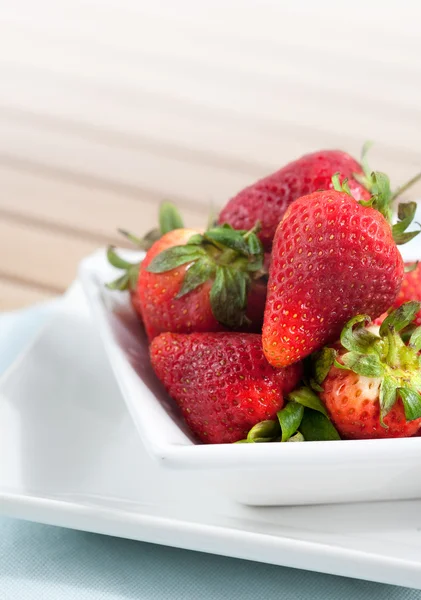 Bowlful of fresh ripened strawberries with room for text — Stock Photo, Image