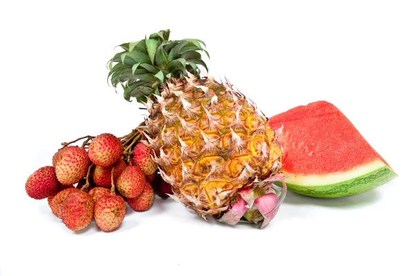 Fruit arrangement of watermelon, pineapple and lychees isolated — Stock Photo, Image