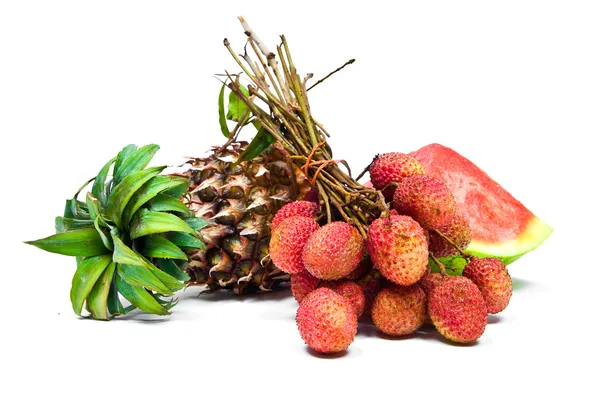 Fruit arrangement of watermelon, pineapple and lychees isolated — Stock Photo, Image
