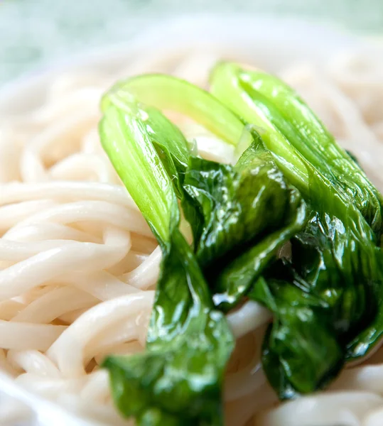 Japanese udon with steamed baby bokchoi, an oriental vegetable — Stock Photo, Image