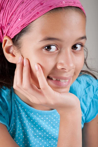 Beautiful girl of European and Asian parentage with pink bandanna. — Stock Photo, Image