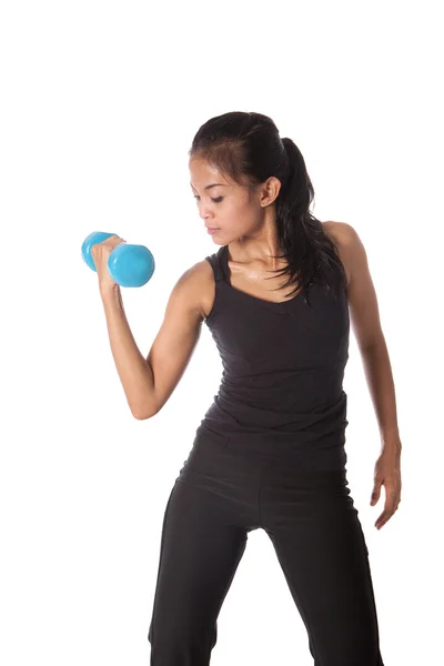 Female fitness trainer in exercise position Stock Photo