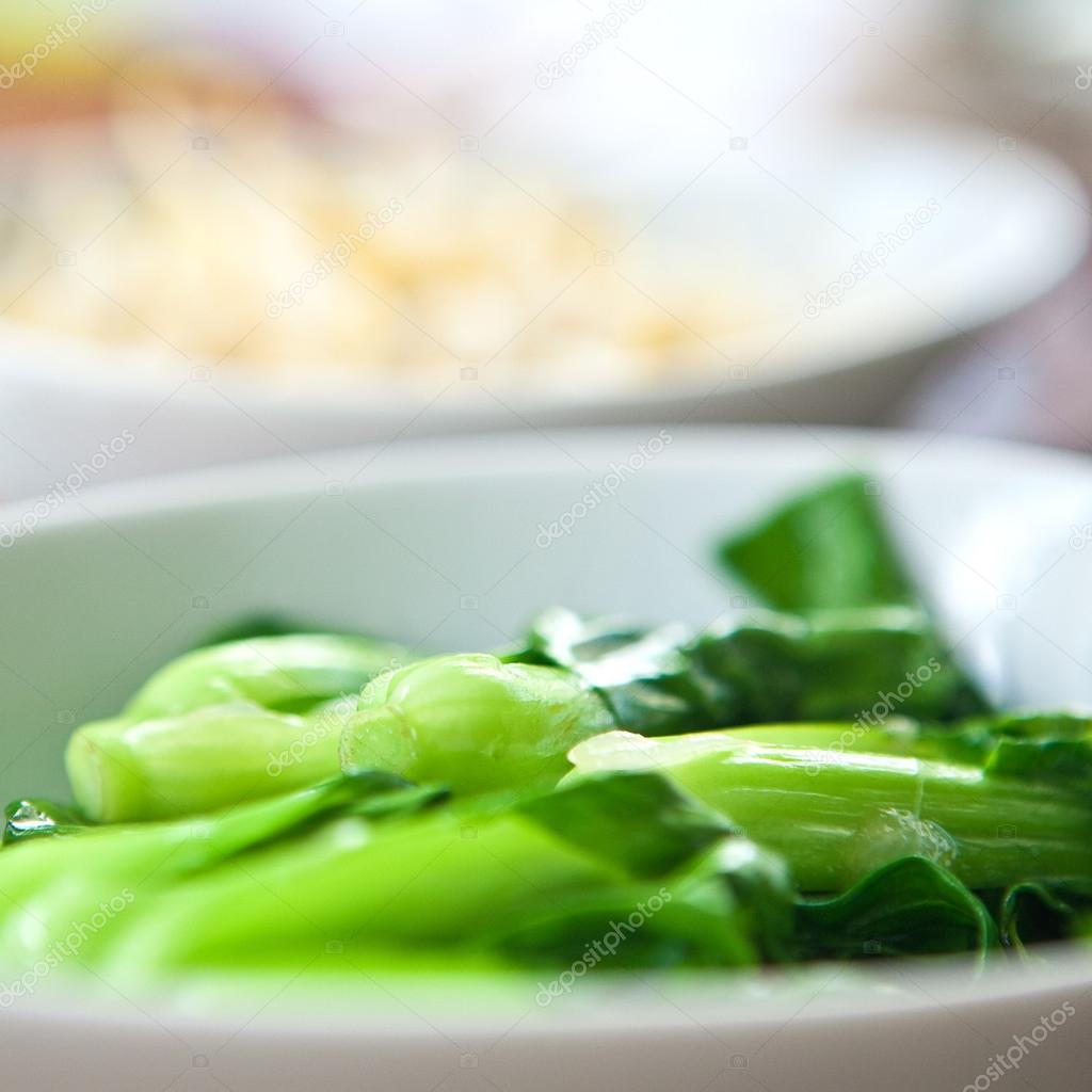 Beautifully steamed and healthy baby green bok choi, an oriental vegetable high in iron