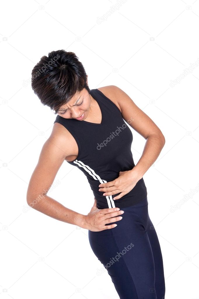 Young athletic woman suffering back pain