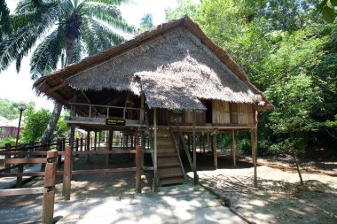 ' Rumah Lotud'' ( Lotud House ), at Monsopiad Cultural Village, Sabah, being one of the typical type of traditional tribal house atypically found in Sabah, Borneo. clipart