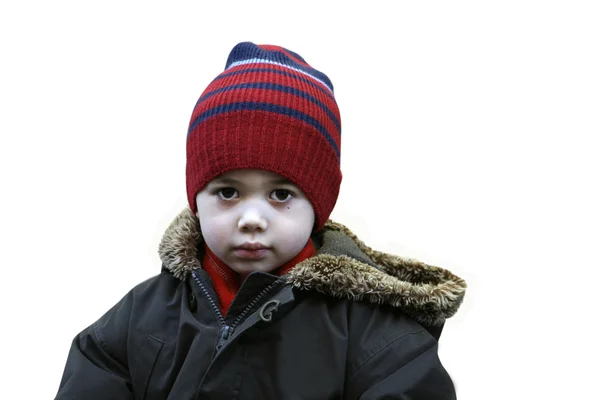 Hermoso niño en abrigo de invierno y sombrero — Foto de Stock