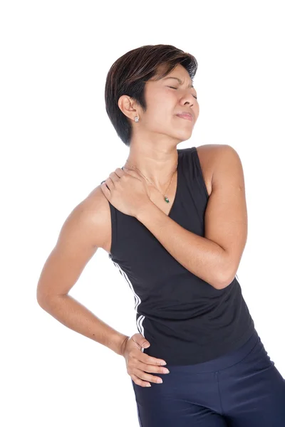 Giovane donna che soffre di dolore sulla spalla — Foto Stock