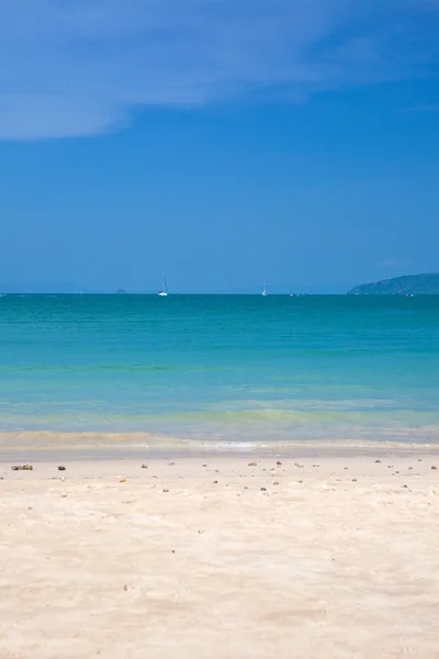 Beautiful sandy beach on sunny day — Stock Photo, Image