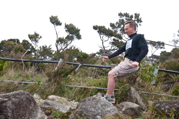 A résztvevők Mássz fel Mt Kinabalu-a nemzetközi Climbathon Stock Fotó