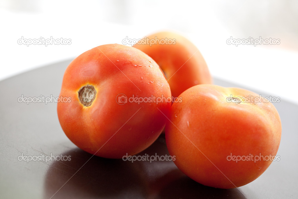 Red tomatoes in skin