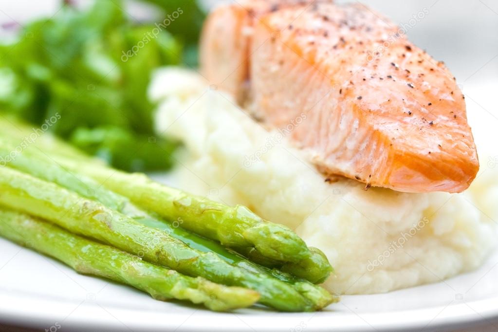 Baked salmon with mash potato and grilled asparagus