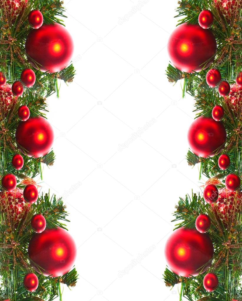 Border of red christmas garland with baubles and ribbons on white.