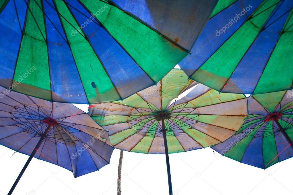 Colorful parasols on a tropical beach.