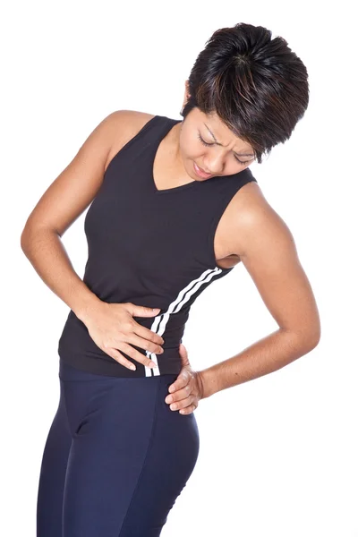 02 Fitness-Frau leidet unter Rückenschmerzen — Stockfoto