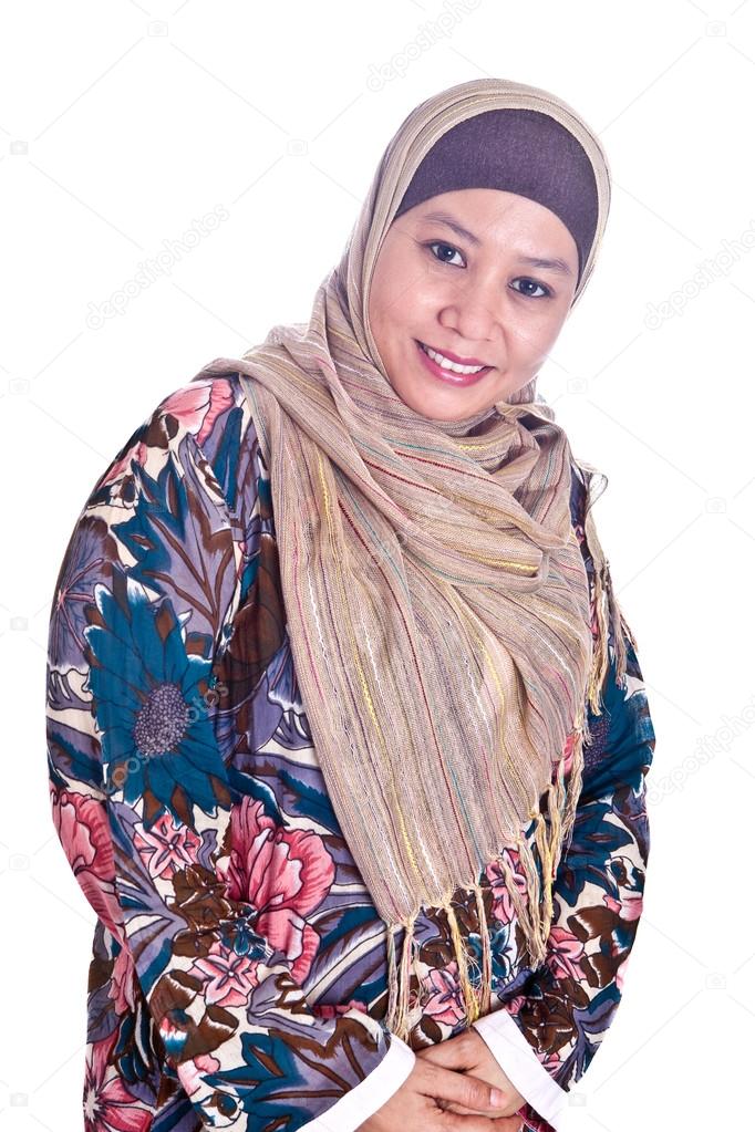 Beautiful happy mature Malay Muslim woman in scarf