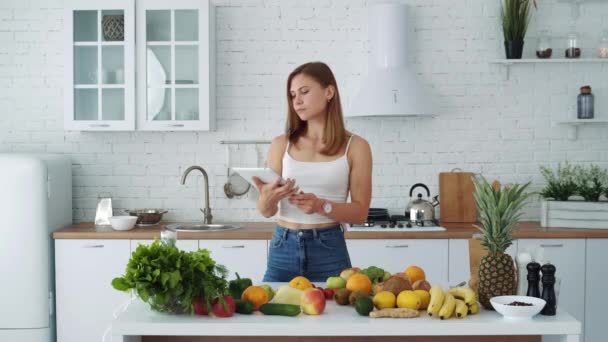 Young Blogger Woman Preparing Food Taking Pictures Phone Tablet Her — Stock Video