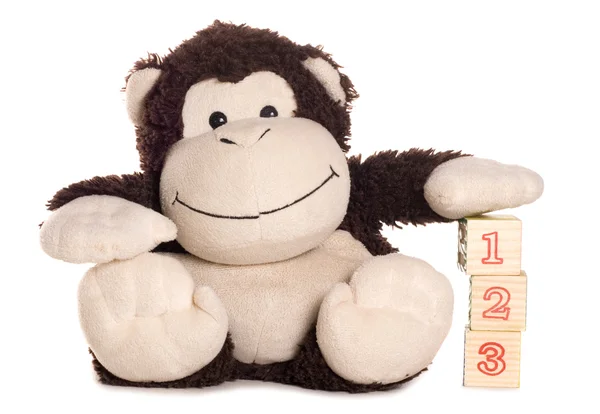 Monkey soft toy learning to count