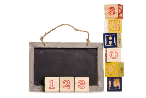 School wooden blocks and black board — Stock Photo, Image