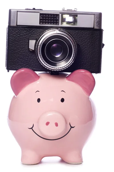 Piggy bank met retro camera uitsparing — Stockfoto